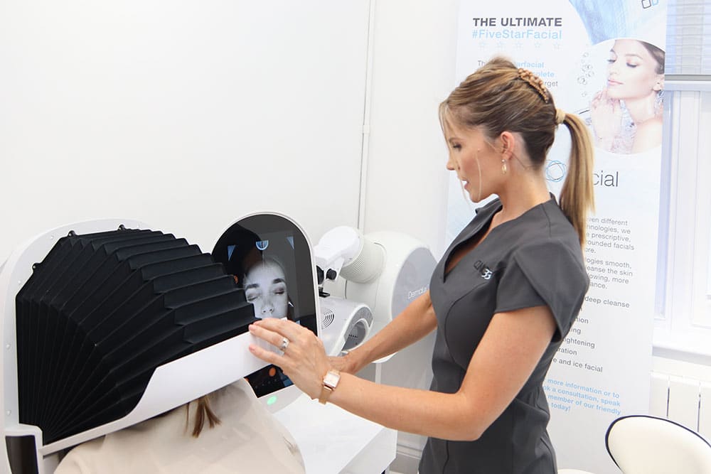 Team member operating skin tightening 